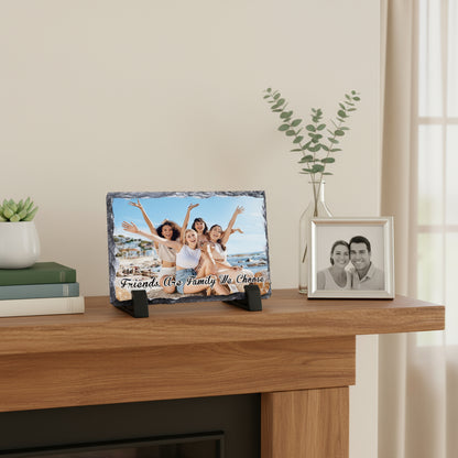 Two framed photos on a wooden surface with a neutral background